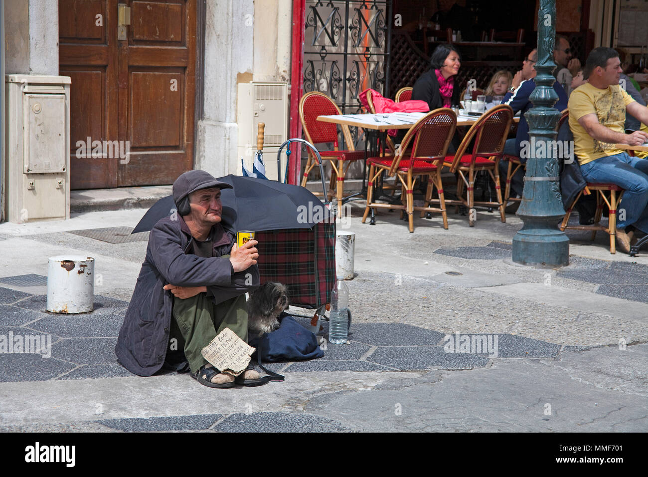 beggar-at-a-street-cafe-nice-cte-dazur-alpes-maritimes-south-france-france-europe-MMF701.jpg