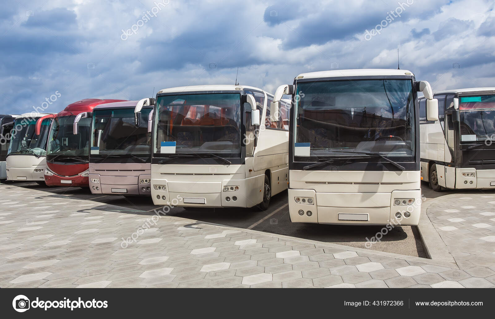 depositphotos_431972366-stock-photo-tourist-buses-in-a-parking.jpg