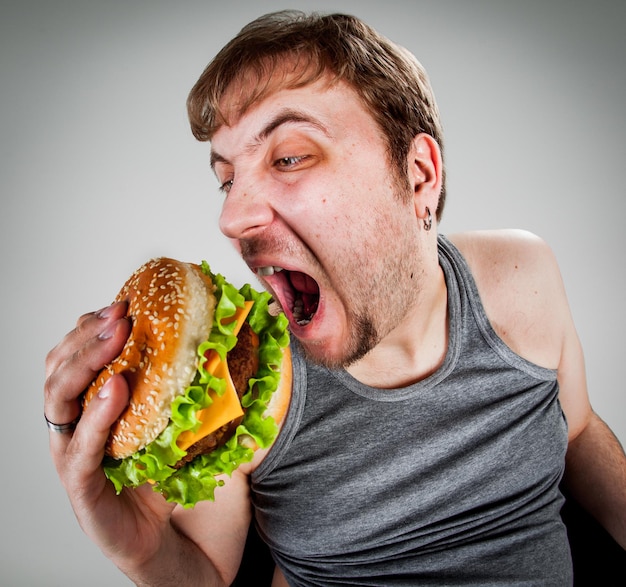 man-eating-hamburger.jpg