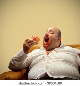 portrait-fat-man-eating-hamburger-260nw-39804589.jpg